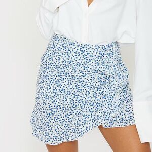 Prettylittlething Blue Floral Tie Detail Frill Edge Wrap Mini Skirt
